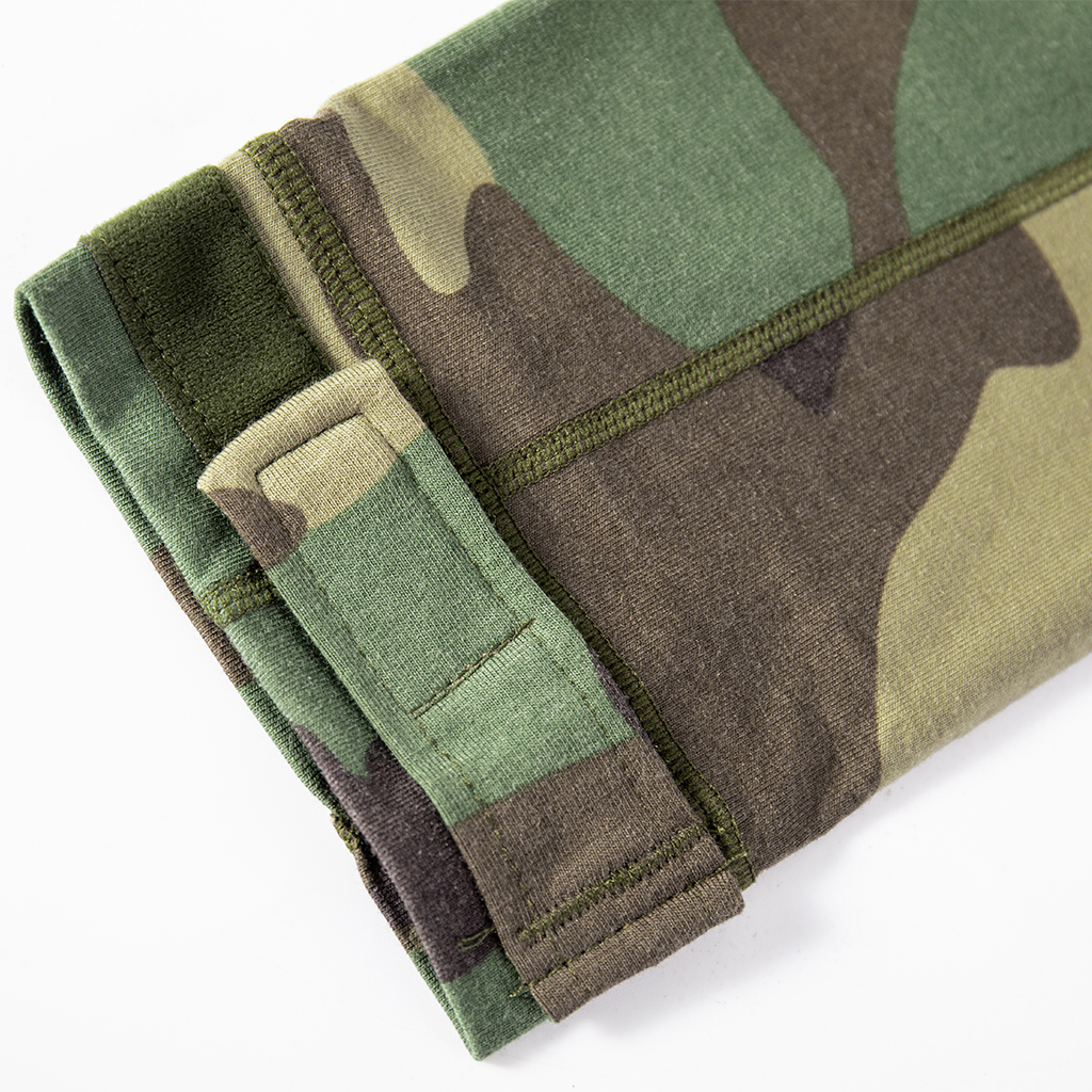 Detail of the adjustable velcro cuff on the sleeve of the custom woodland camo G4 combat shirt.