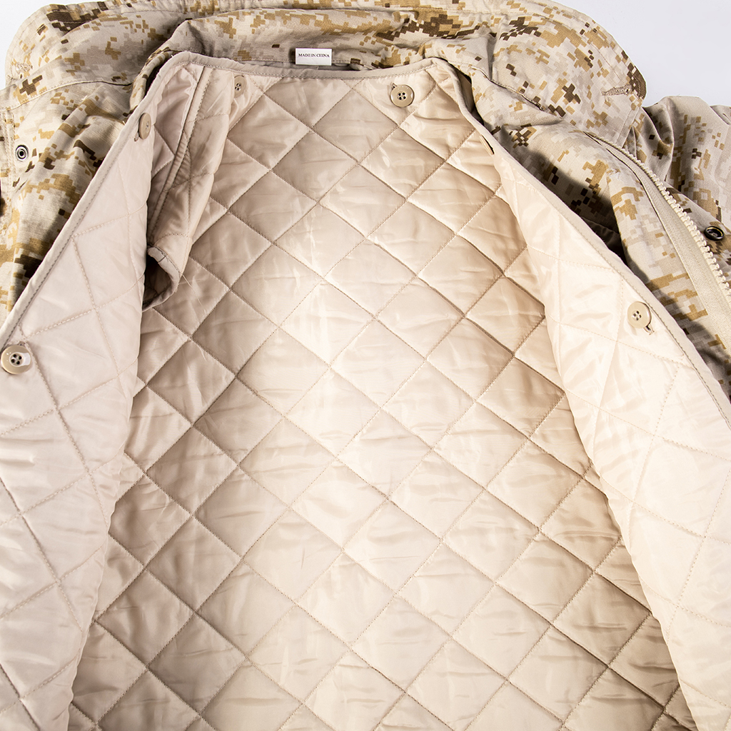 Interior view of the custom digital desert M65 field jacket showing the optional removable quilted liner.