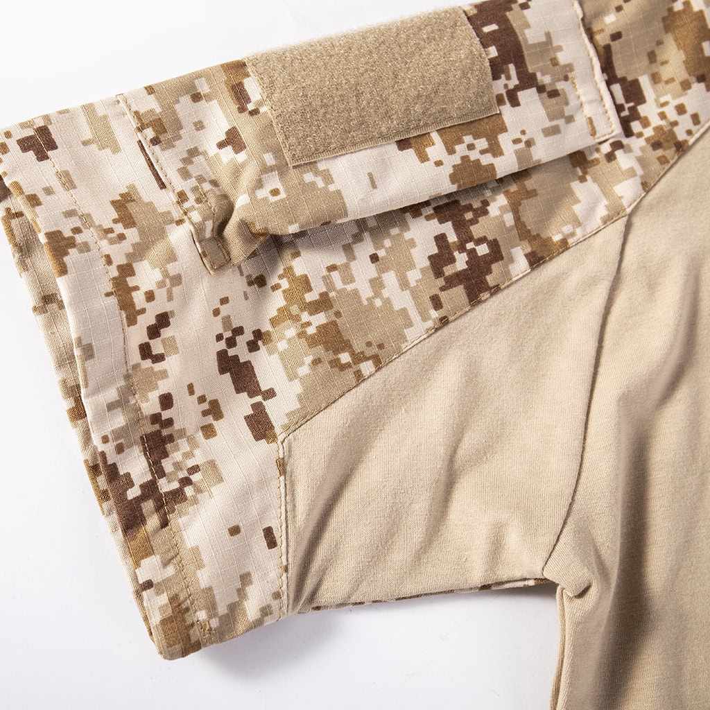 Detail of the gusseted underarm and sleeve construction on the short sleeve desert digital combat shirt.