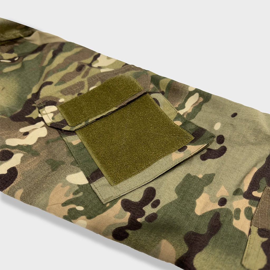 Close-up of the velcro arm pocket on the sleeve of the custom CP camo G3 combat shirt.