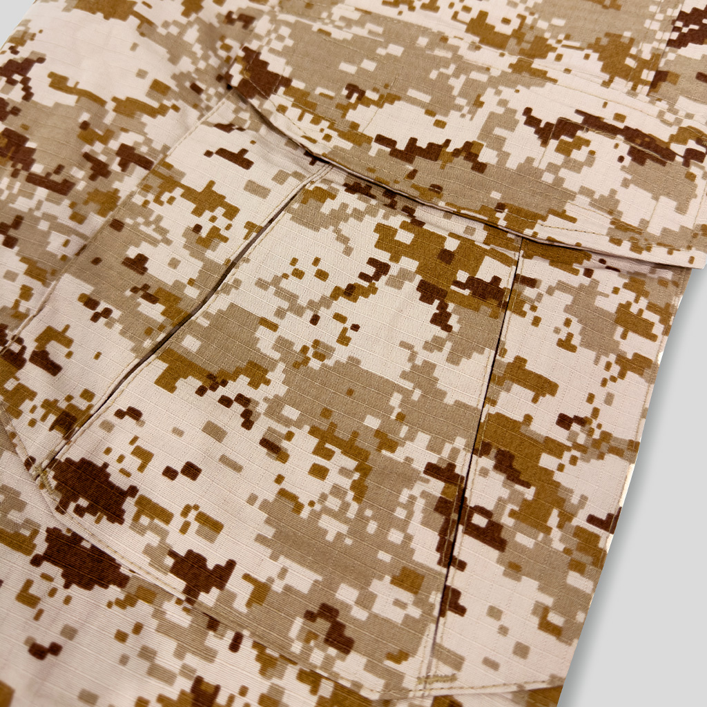 Close-up of the large thigh cargo pocket on the custom digital desert G2 combat uniform trousers.