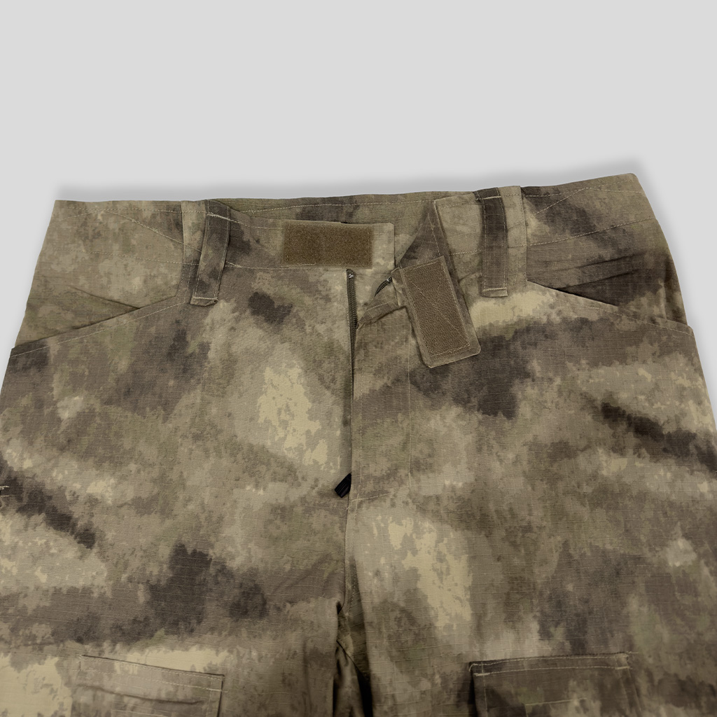 Close-up of the velcro-adjustable waistband on the custom Mali desert camo G2 combat uniform trousers.