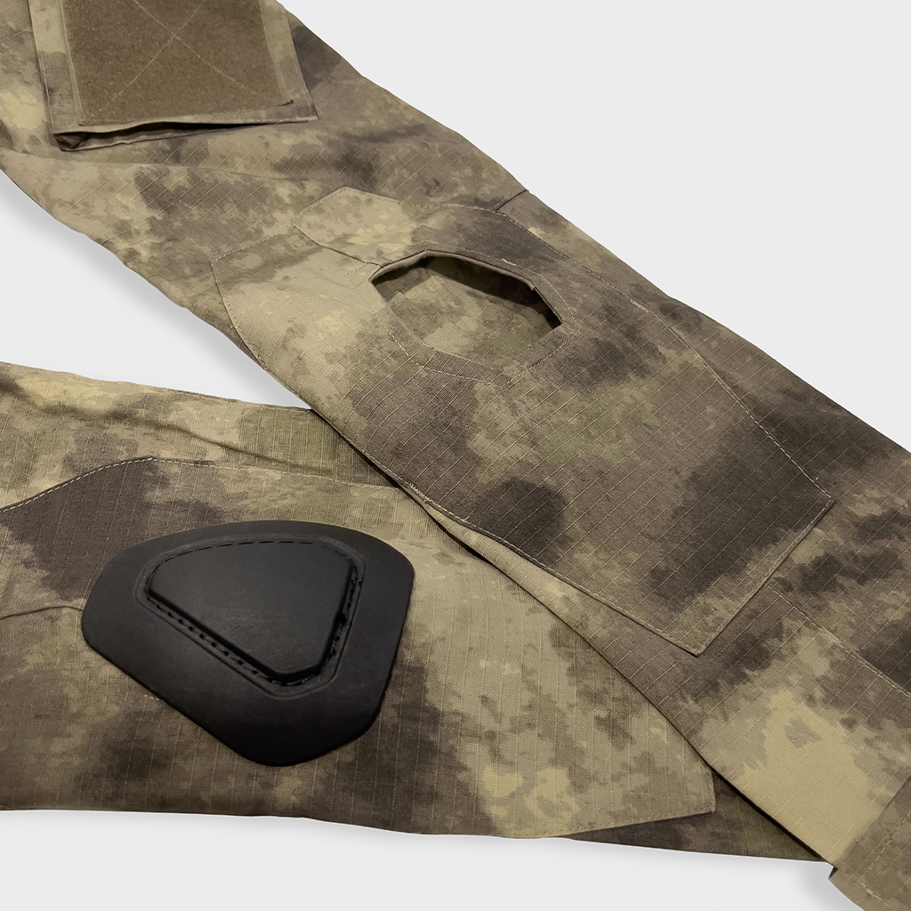 Detail of the integrated elbow pad pocket with a removable hard-shell pad on the custom Mali desert camo G2 combat shirt.