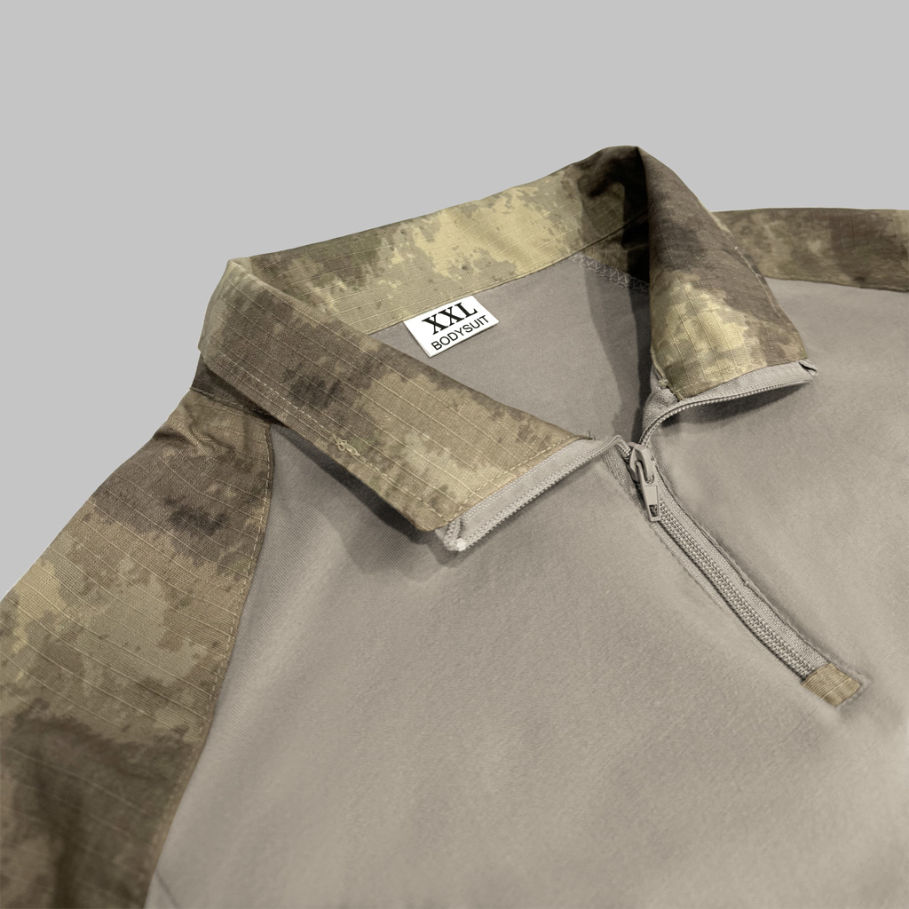 Close-up of the quarter-zip collar on the custom Mali desert camo G2 long sleeve combat shirt.