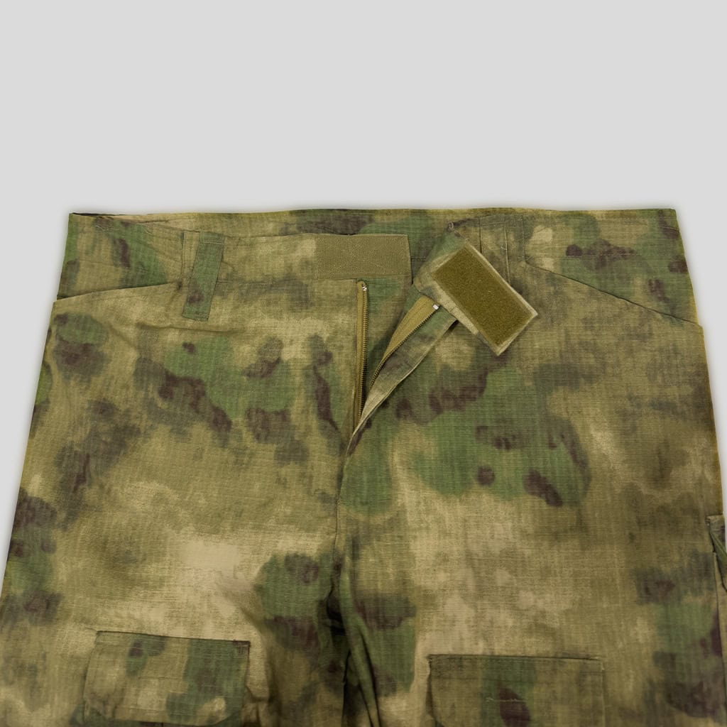 Close-up of the velcro-adjustable waistband on the custom ATACS G2 combat uniform trousers.