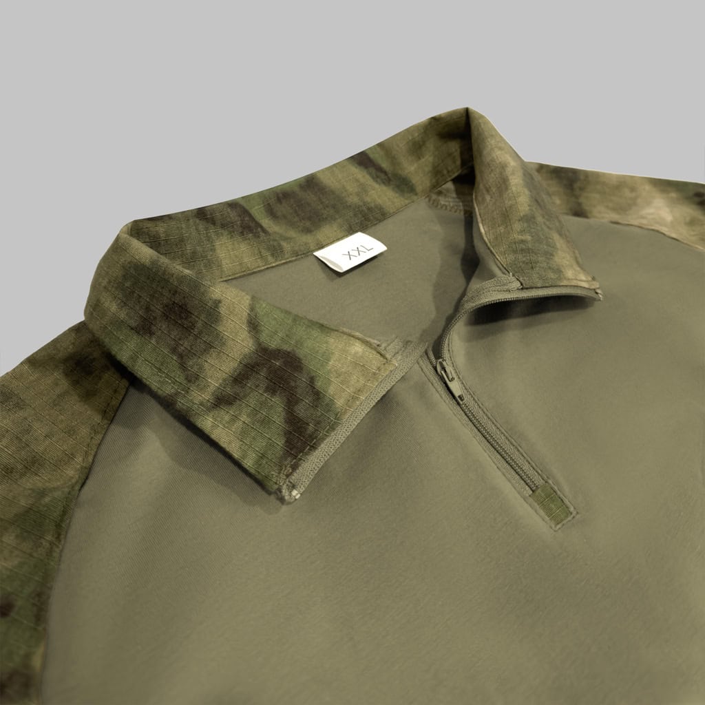 Close-up of the quarter-zip collar on the custom ATACS G2 long sleeve combat shirt.