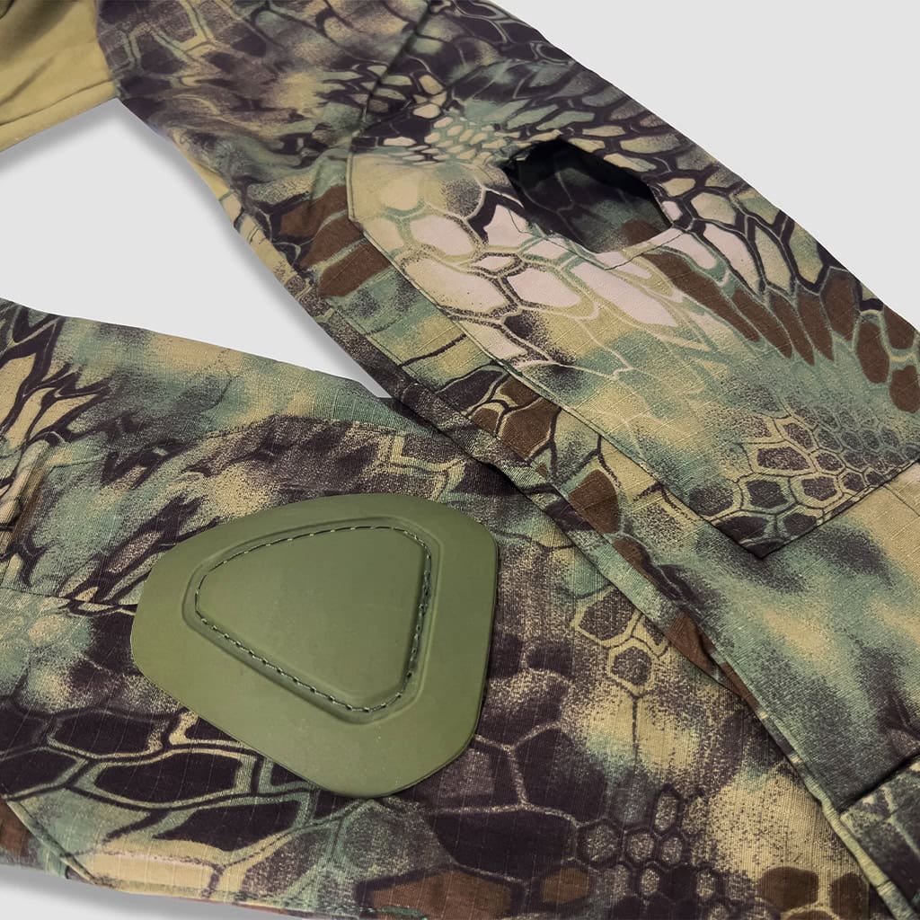 Detail of the integrated elbow pad pocket on the sleeve of the custom woodland python camo G2 combat shirt.