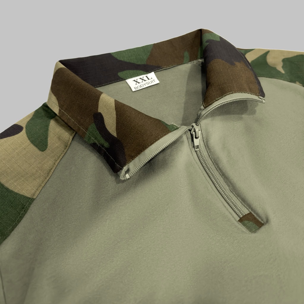 Close-up of the quarter-zip collar on the custom woodland camo G2 long sleeve combat shirt.