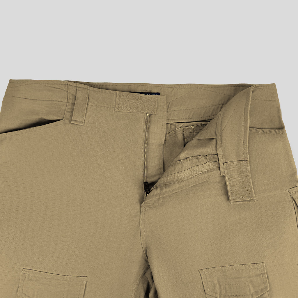 Close-up of the velcro-adjustable waistband on the custom khaki G2 combat uniform trousers.