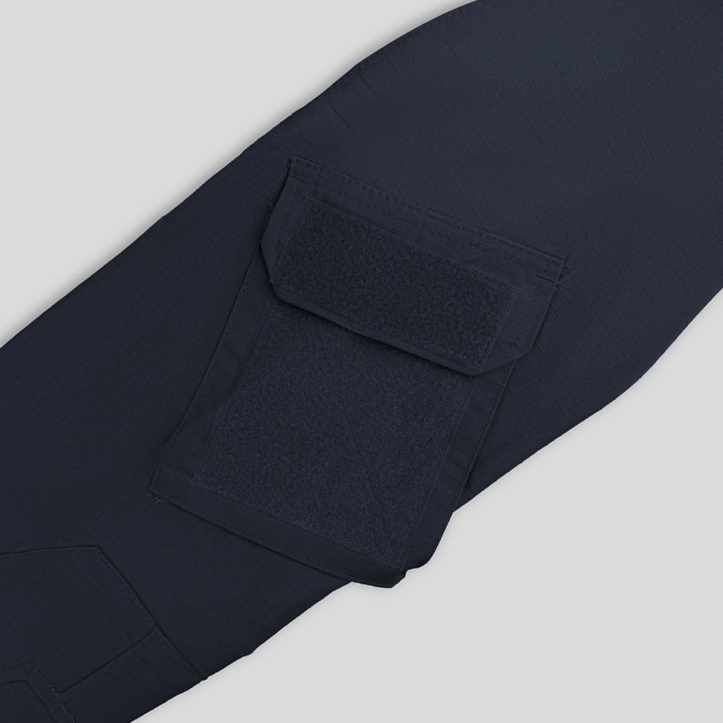 Close-up of the large thigh cargo pocket on the custom navy blue G2 combat uniform trousers.