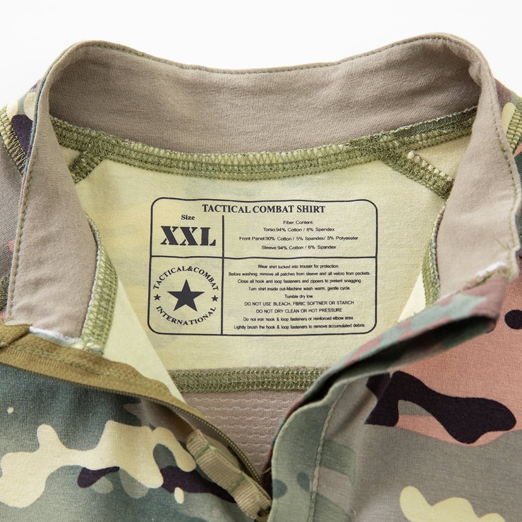 Close-up of the quarter-zip stand-up collar and brand tag on the custom CP camo G4 short sleeve combat shirt.