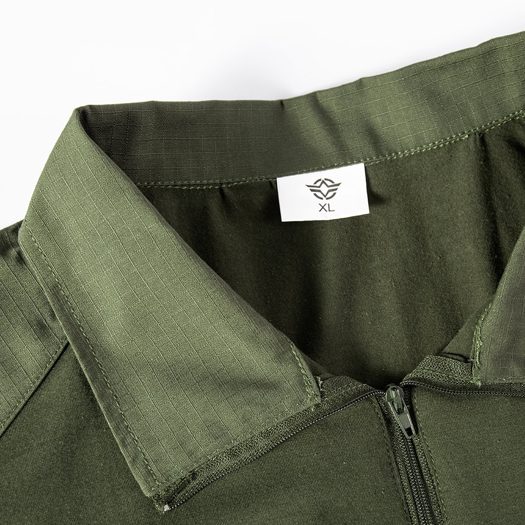 Close-up of the quarter-zip collar on the custom olive green short sleeve tactical shirt.