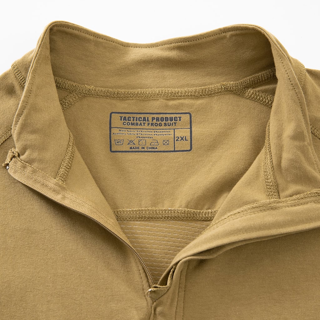 Close-up of the quarter-zip stand-up collar and brand tag on the custom tan G4 short sleeve combat shirt.