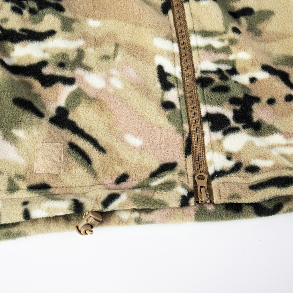 Detail of a zippered chest pocket on the custom CP camo fleece tactical jacket.