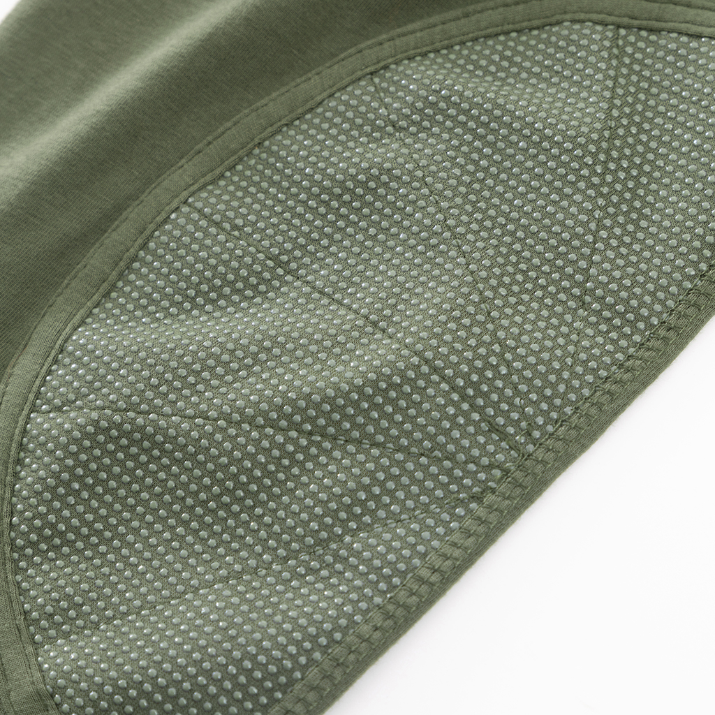 Detail of the integrated anti-slip elbow pad on the sleeve of the custom olive green G4 long sleeve combat shirt.