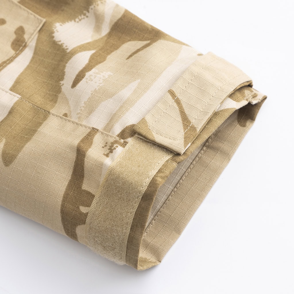 Detail of the adjustable velcro cuff on the sleeve of the custom British desert camo G2 combat shirt.