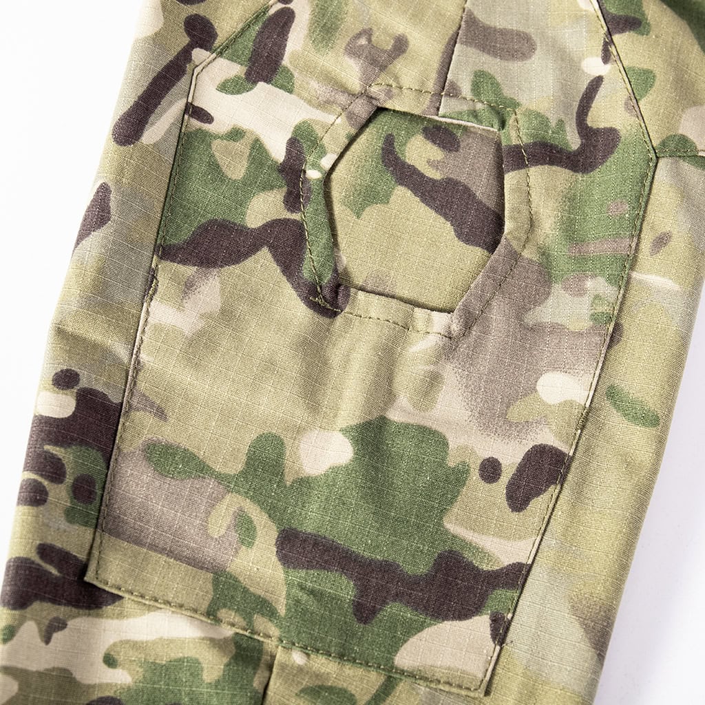 Detail of the integrated elbow pad pocket on the sleeve of the custom CP camo long sleeve combat shirt.