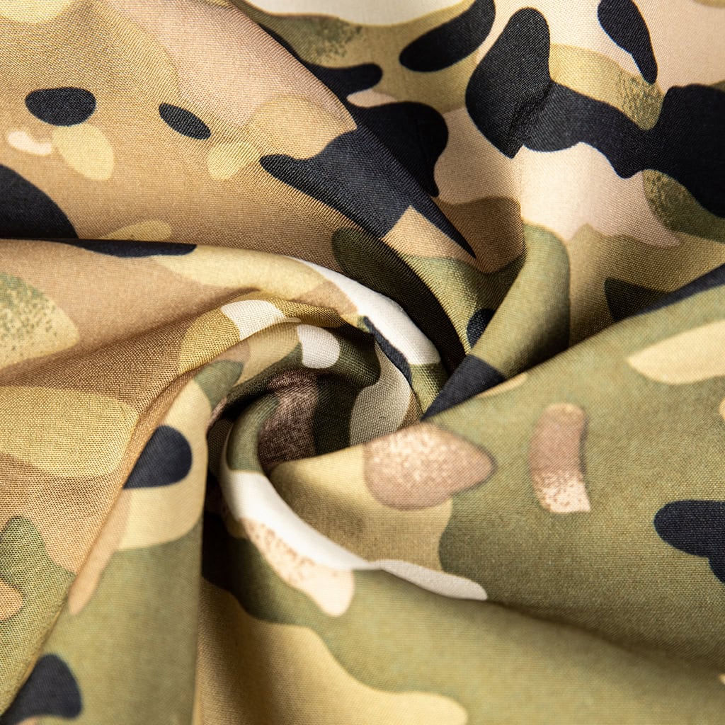 Close-up of the durable, water-resistant polyester softshell fabric in CP camouflage.