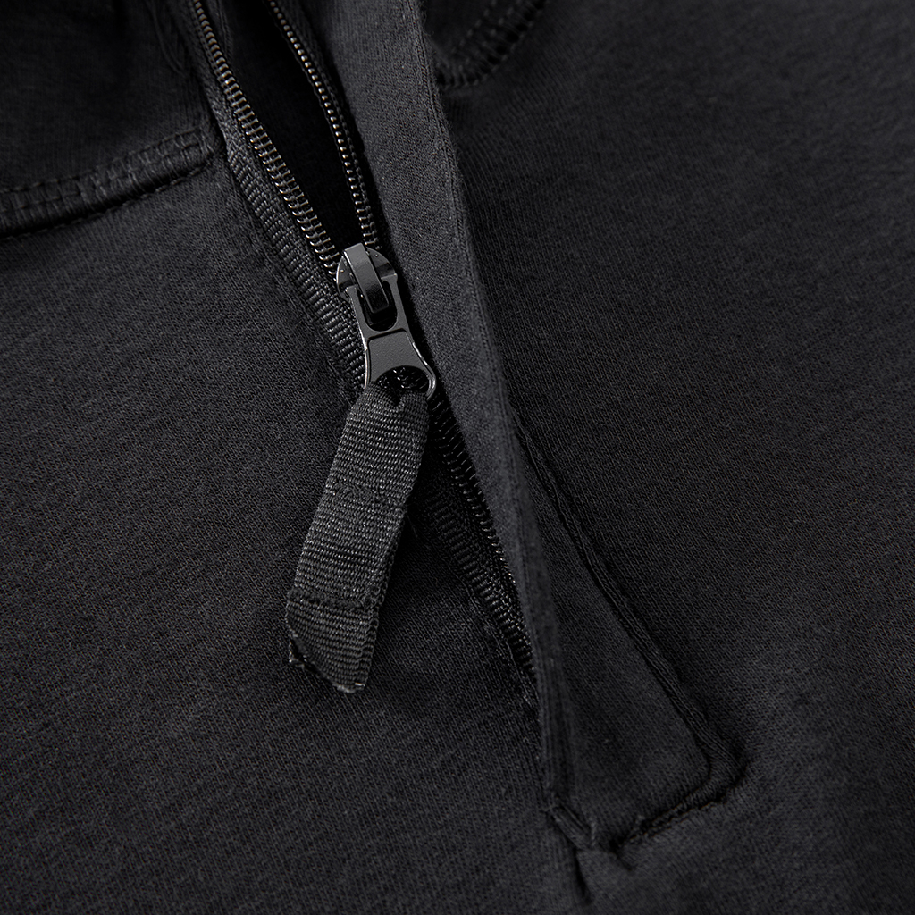 Close-up of the premium zipper at the neckline of the custom black G4 short sleeve combat shirt.