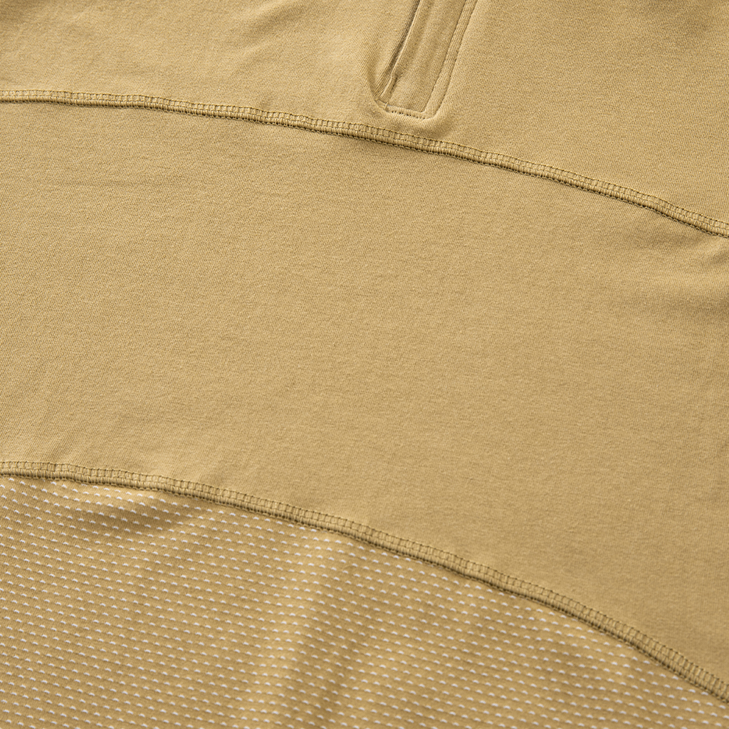 Close-up of the highly breathable mesh fabric on the lower torso of the custom tan G4 short sleeve combat shirt.