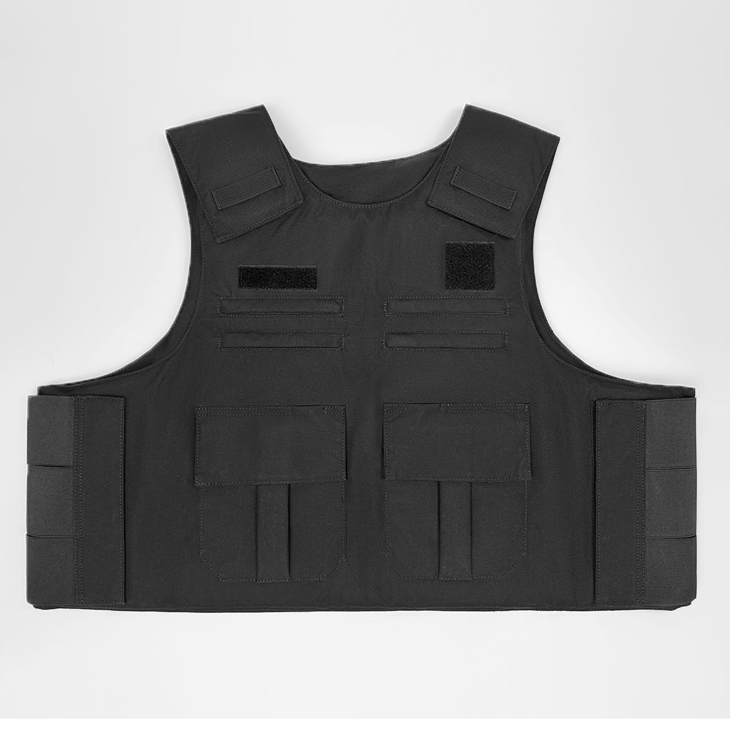 Front view of the custom black concealable body armor vest carrier with multiple utility pockets and velcro panels.