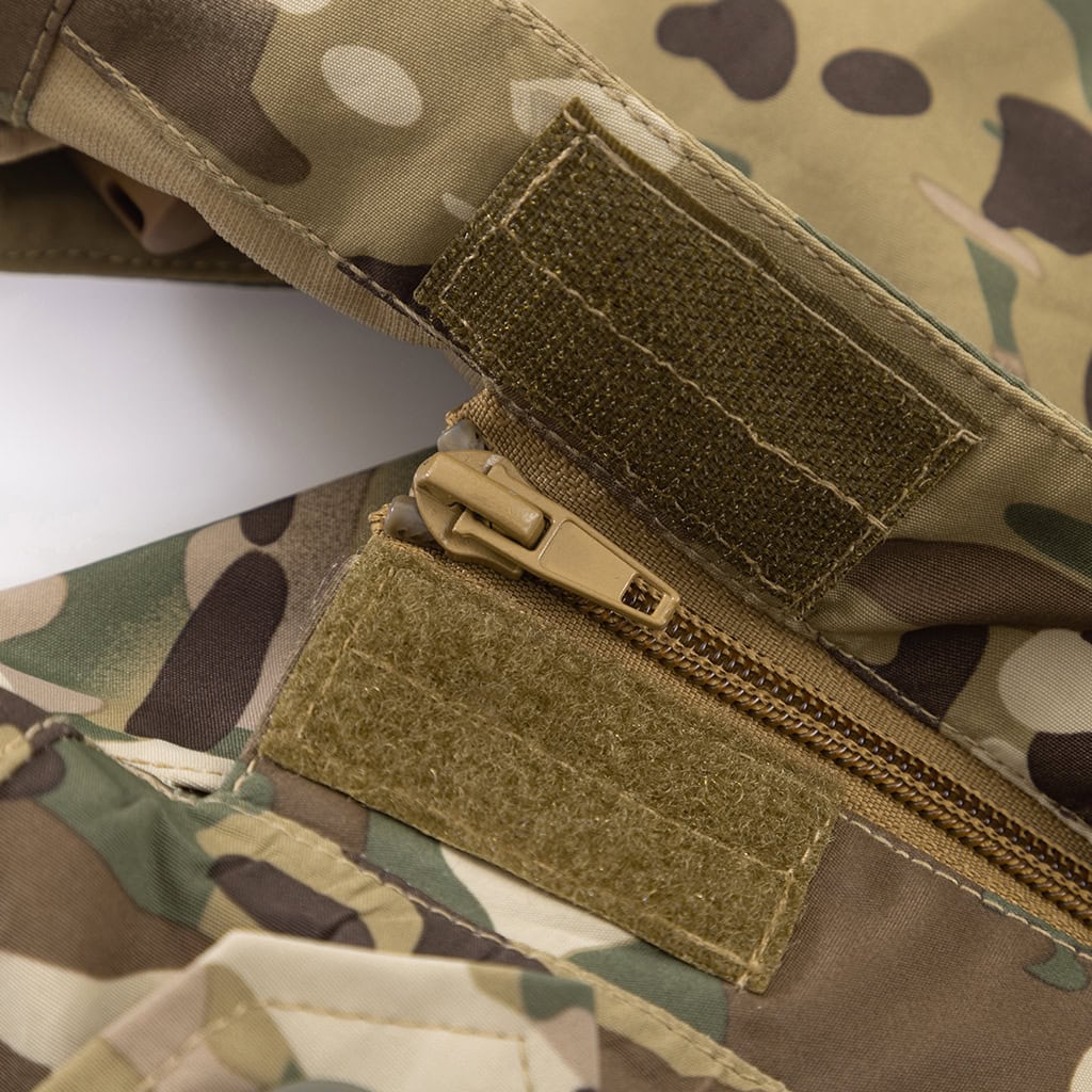 Close-up of the zippered arm pocket with a large velcro panel on the sleeve of the custom CP camo M65 style parka jacket.