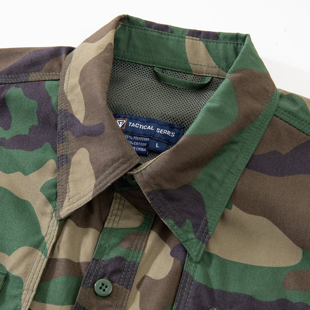 Close-up of the traditional collar and brand tag on the custom woodland camo short sleeve BDU shirt.