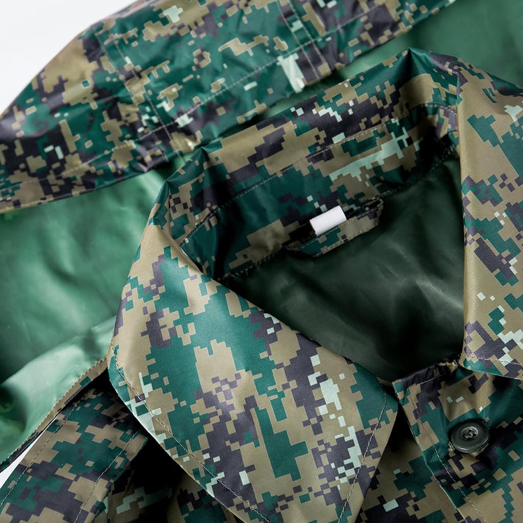 Close-up of the wide lapel collar and integrated hood on the custom jungle digital long raincoat.
