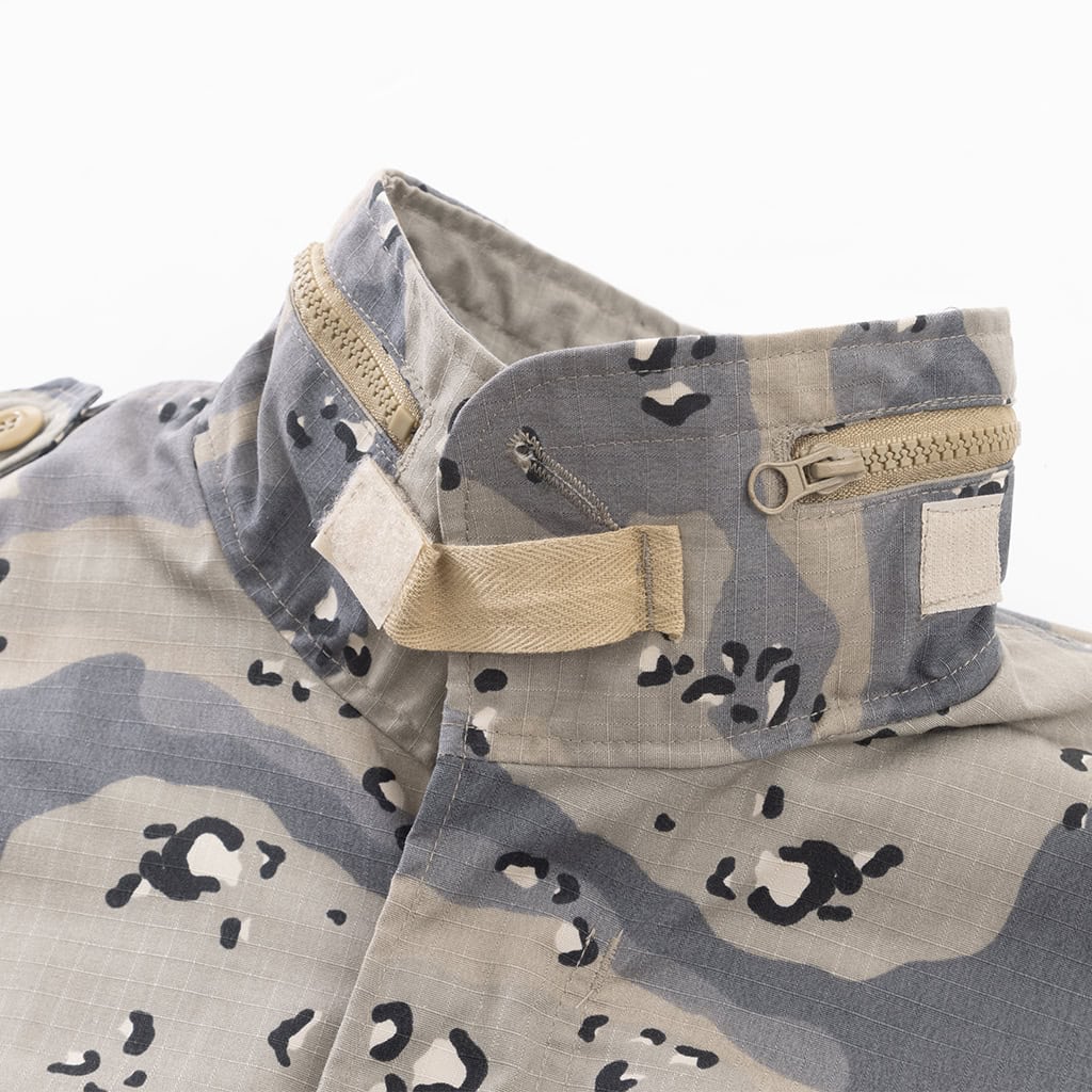 Close-up of the zippered collar compartment containing the stowable hood on the custom Saudi 6-color desert M65 jacket.