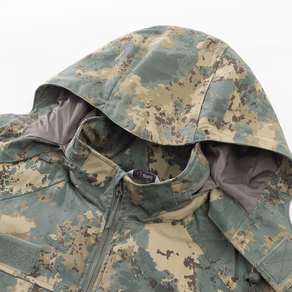 Close-up of the fleece-lined collar and stowable hood compartment on the custom Azerbaijan camo softshell jacket.