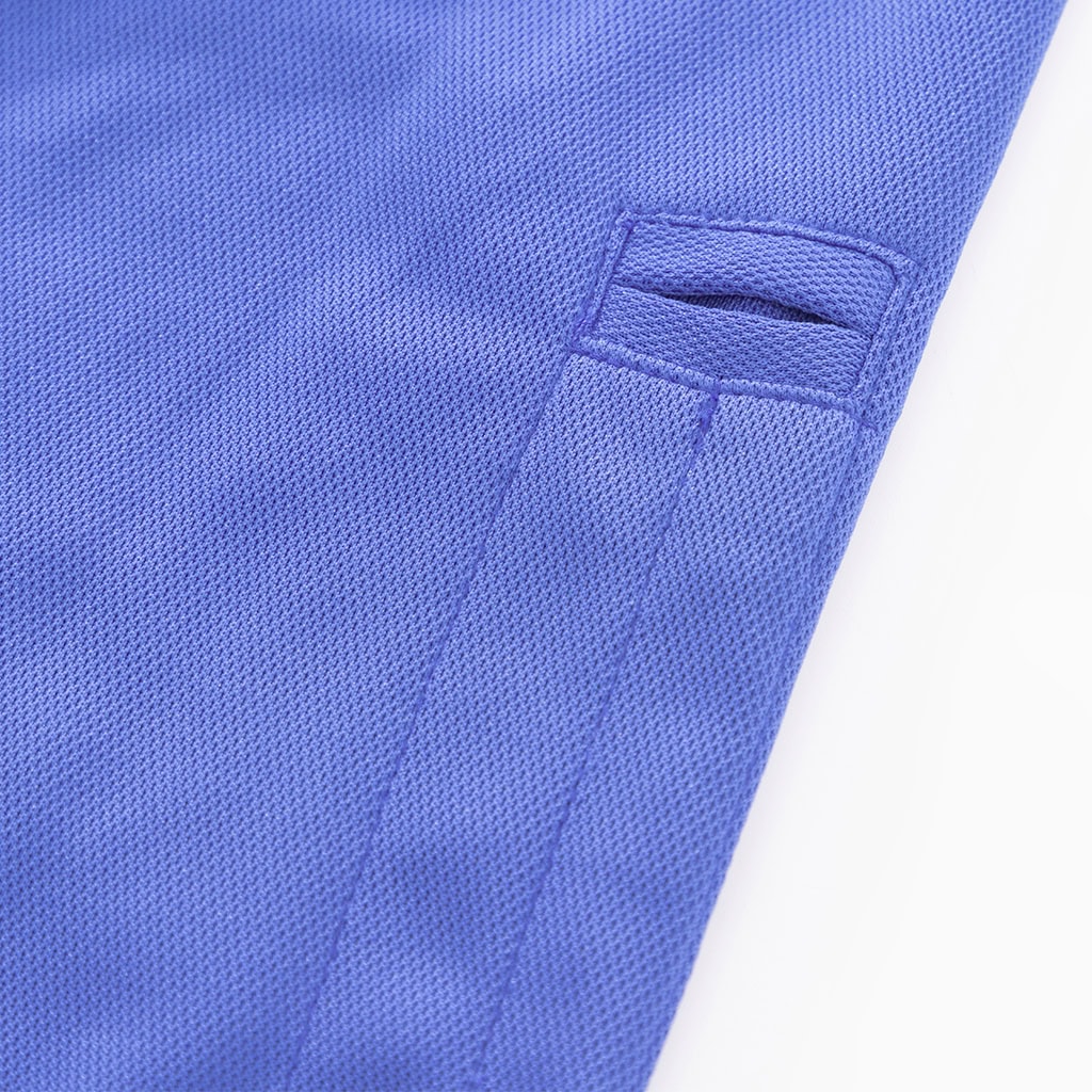 Detail of the reinforced shoulder loop (epaulette) on the custom long sleeve security polo shirt.