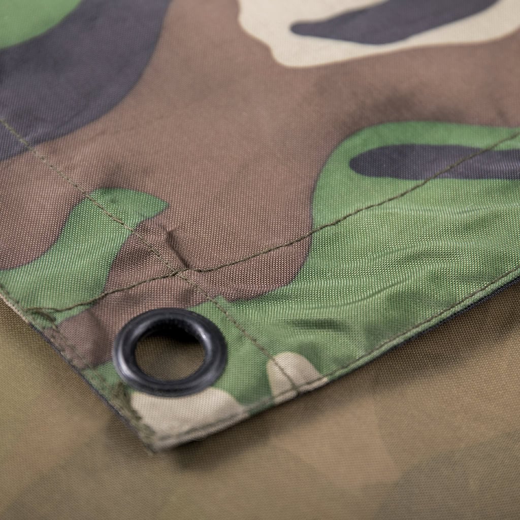 Detail of the durable metal grommet hole on the corner of the custom Nepal camo military rain poncho.