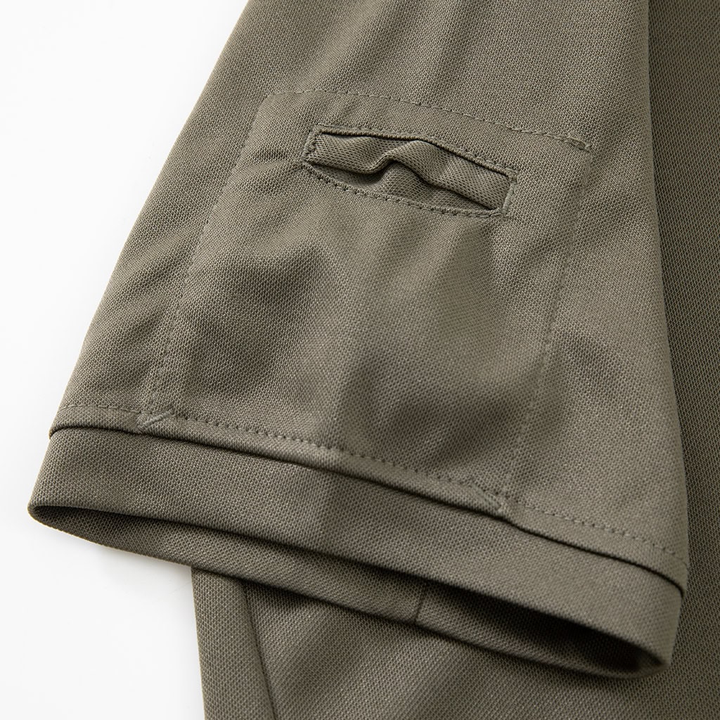 Close-up of the zippered arm pocket with velcro panel on the sleeve of the custom olive green tactical t-shirt.