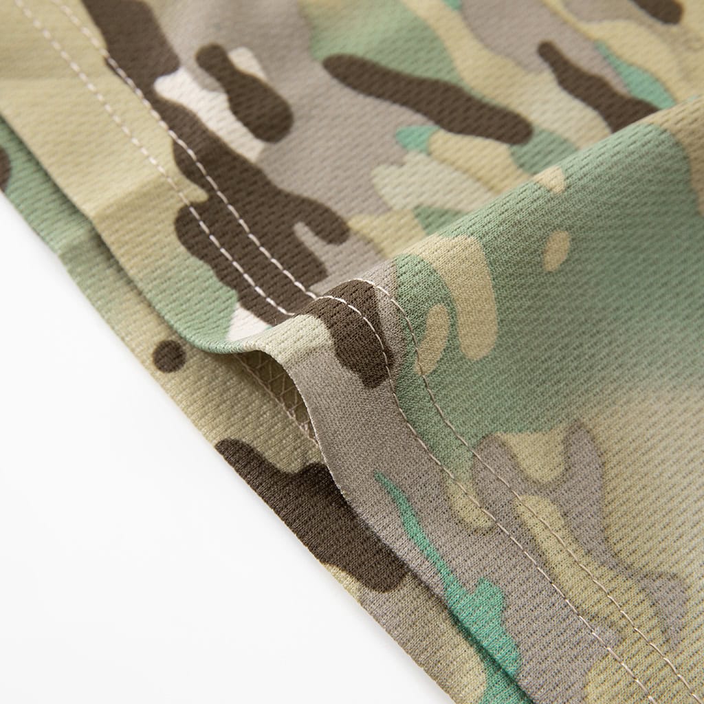 Close-up of the durable, double-stitched hem on the custom CP camo quick-dry t-shirt.