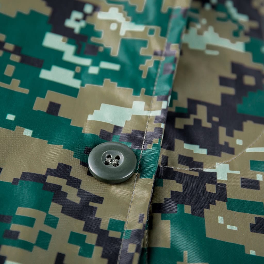 Close-up of a high-end custom button on the front of the jungle digital long raincoat.
