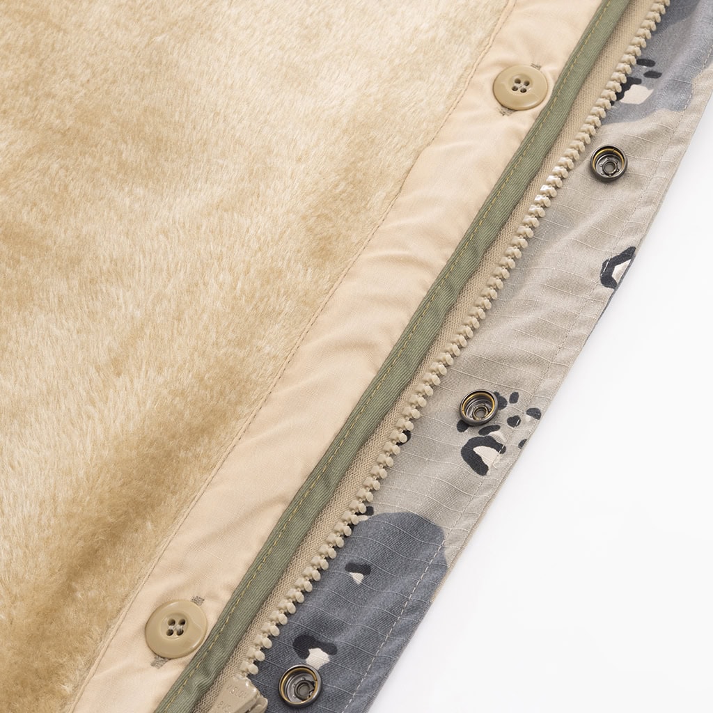 Interior view of the custom Saudi 6-color desert M65 jacket showing the button-in attachment points for the removable liner.
