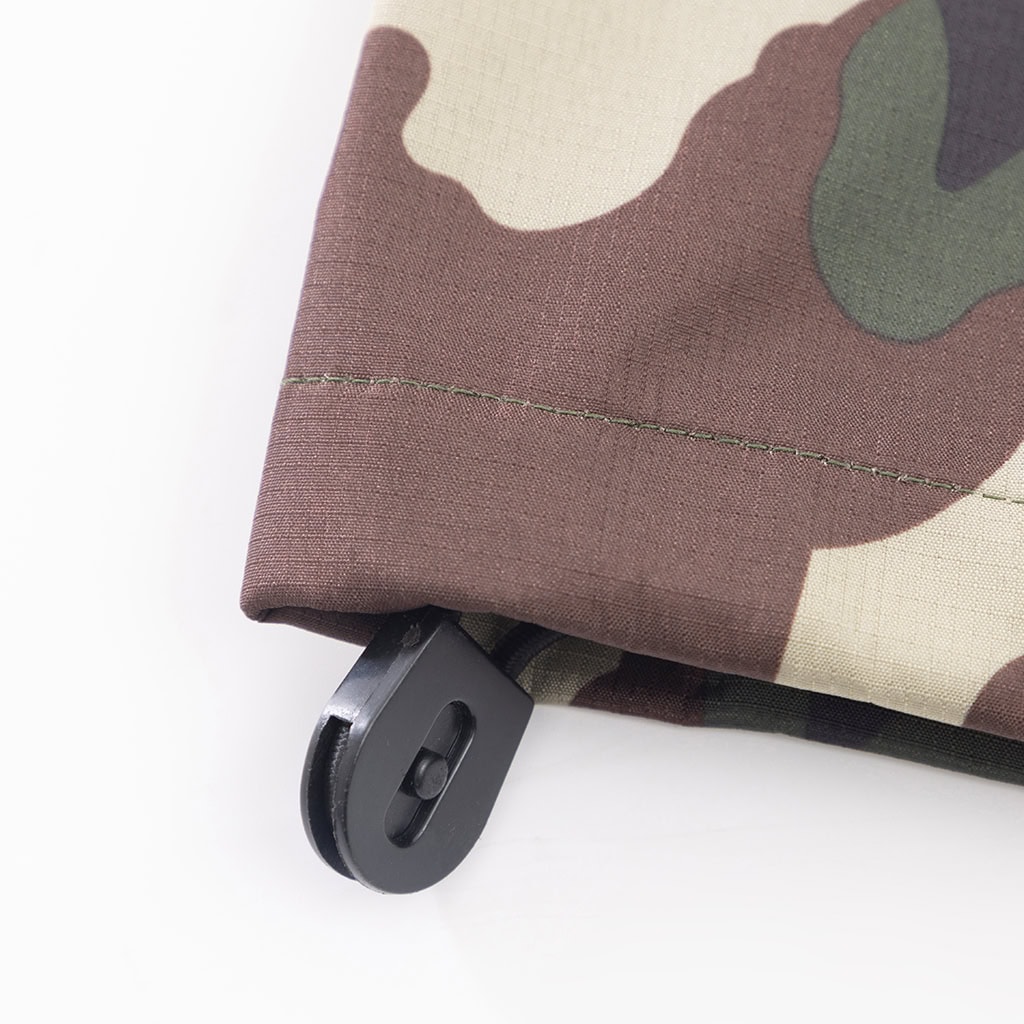 Close-up of the adjustable velcro cuff on the sleeve of the custom woodland camo military rain poncho.
