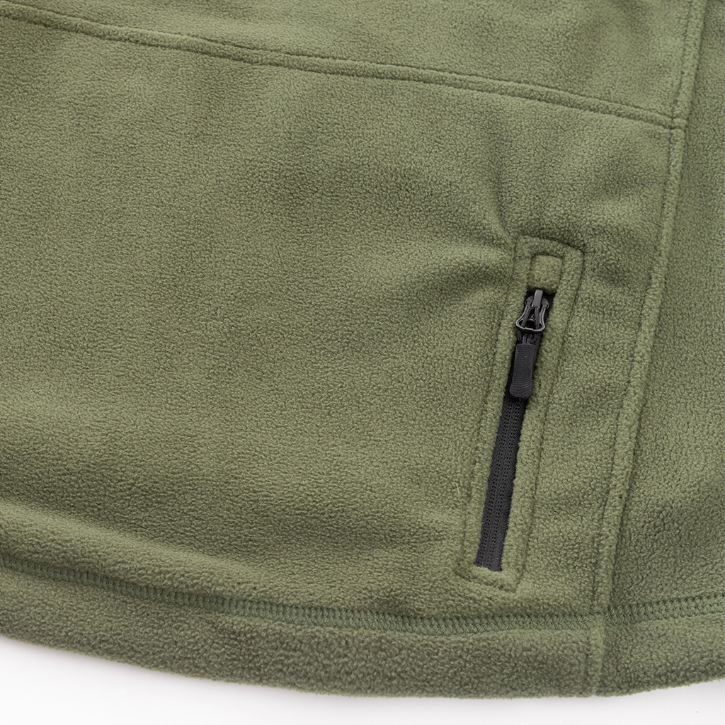 Close-up of the zippered pocket on the lower back of the custom olive green fleece tactical jacket.