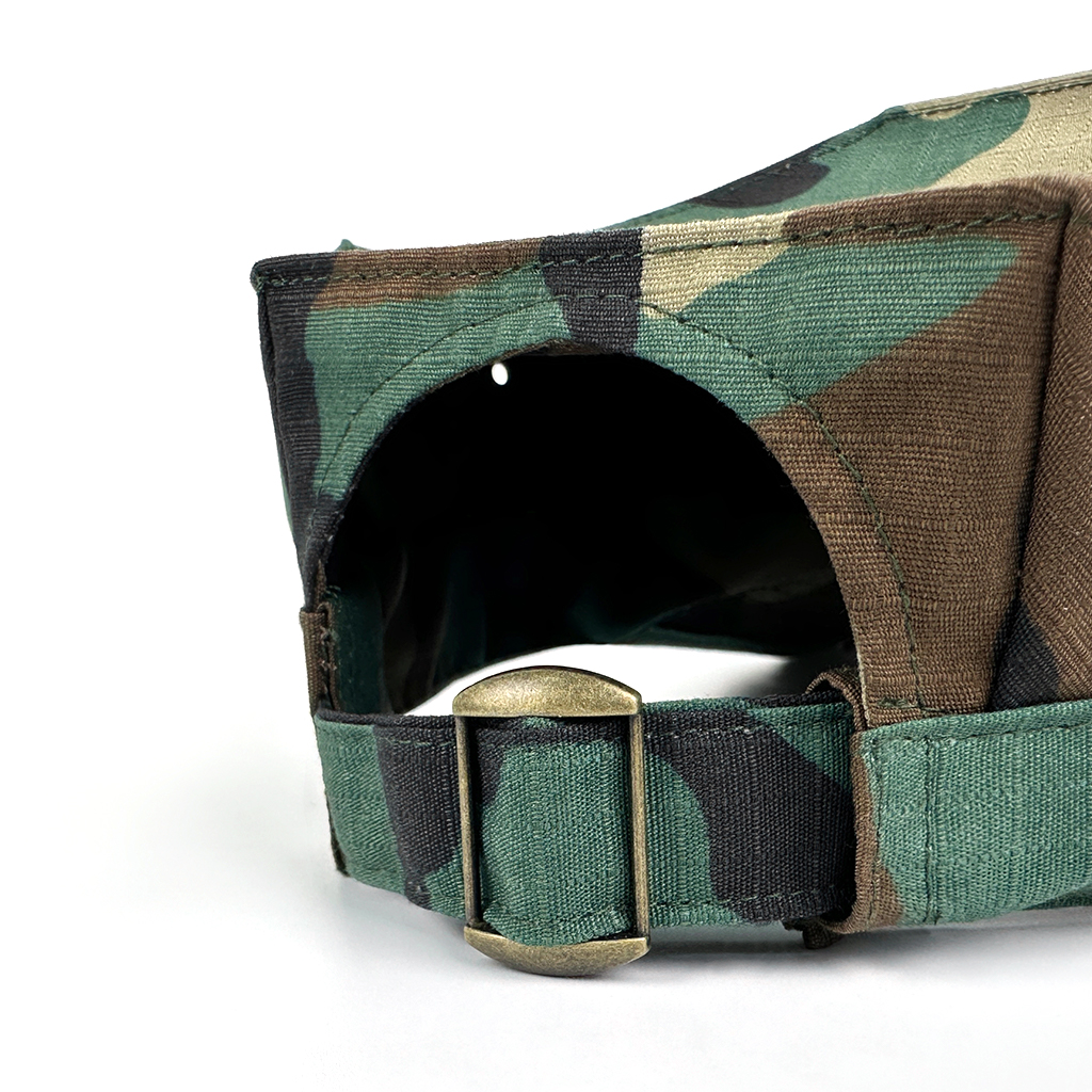 Octagonal jungle camouflage cap angled product view
